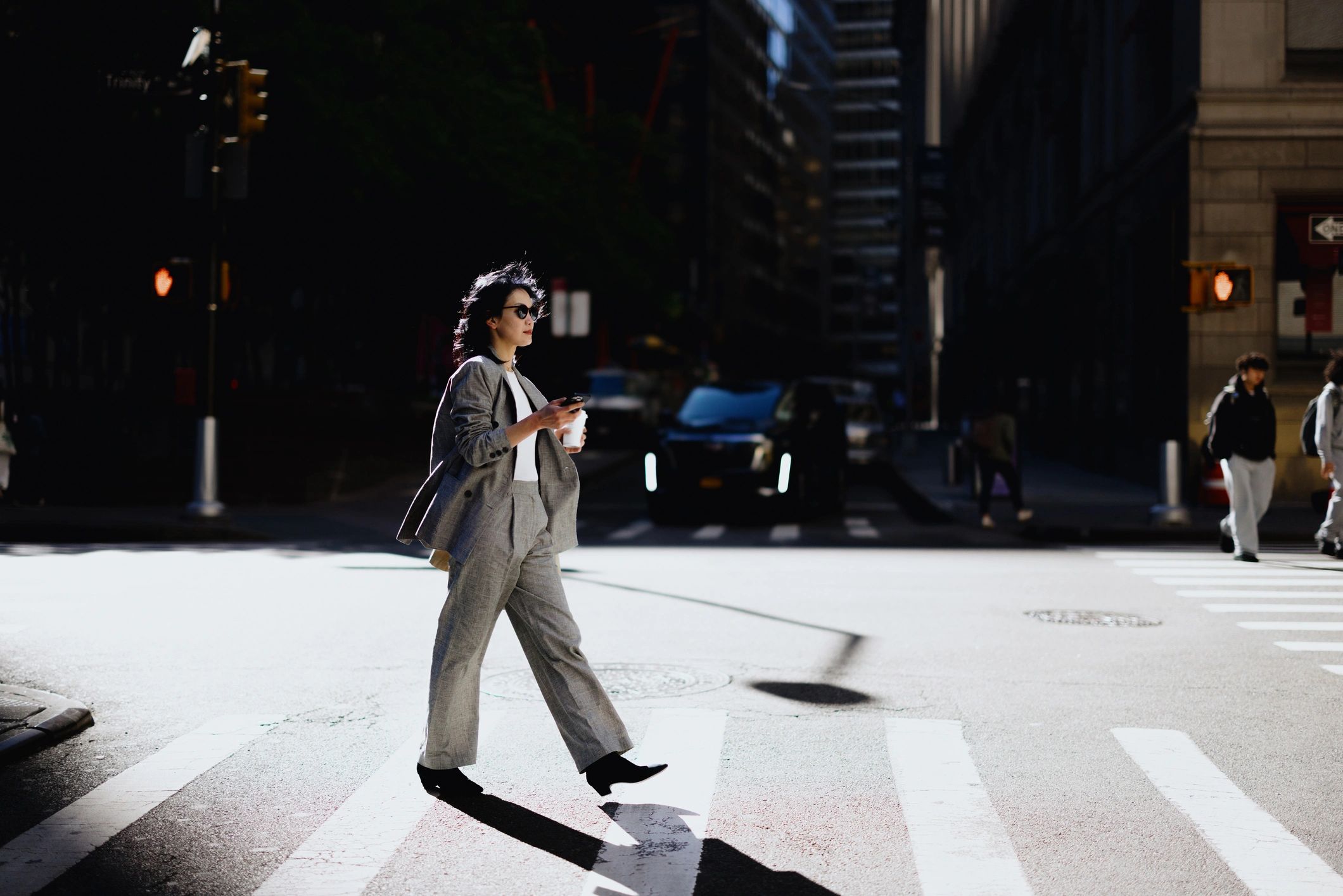 Businesswoman crossing a New York City street